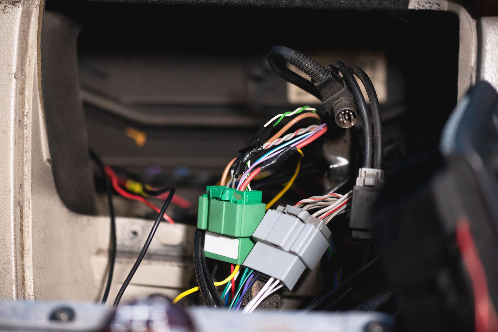 Sound Source technician completing a professional vehicle electronics installation