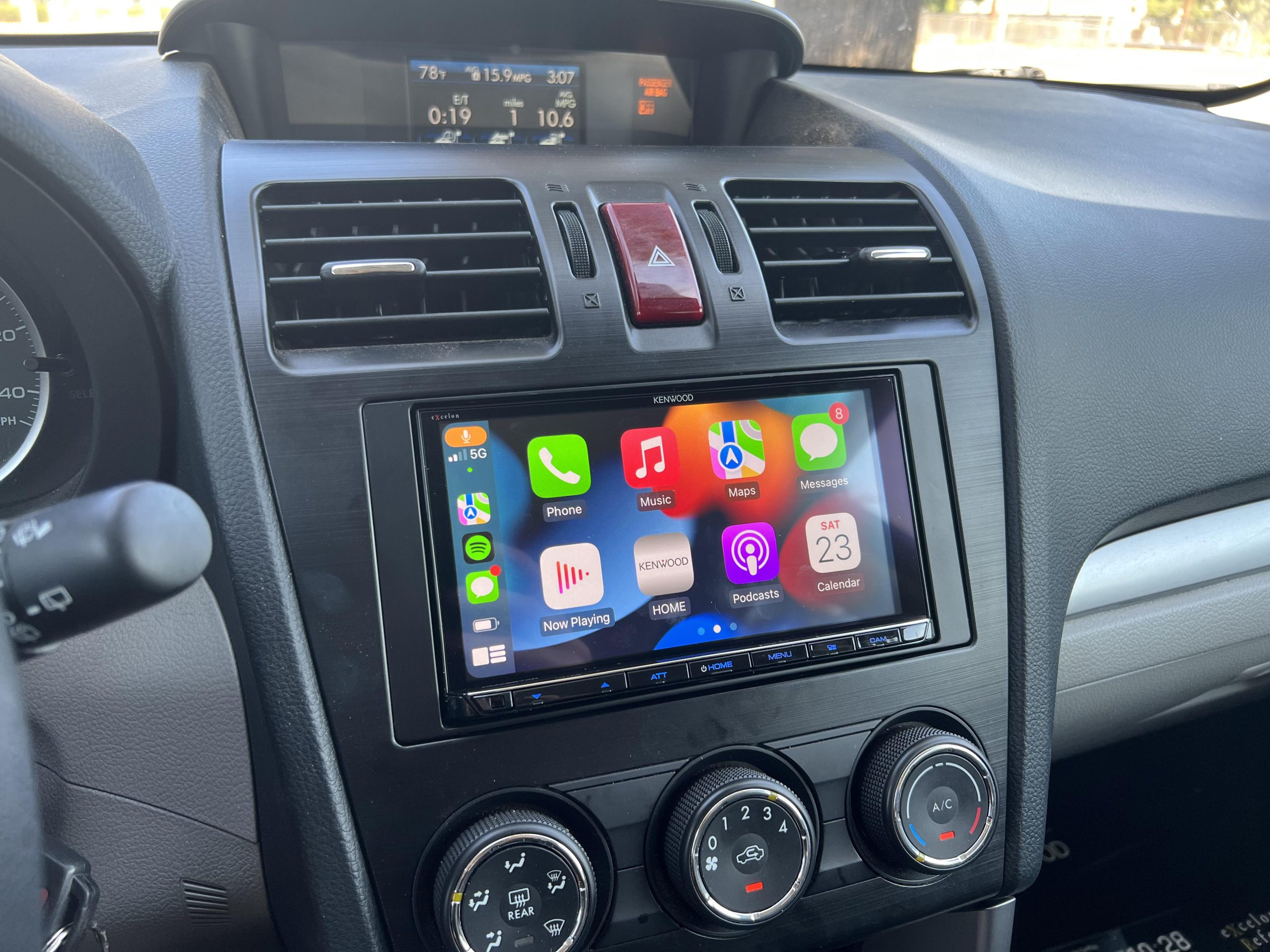 Aftermarket Apple CarPlay and Android Auto touchscreen installation in a vehicle